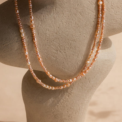 Collar de perlas ruborizadas