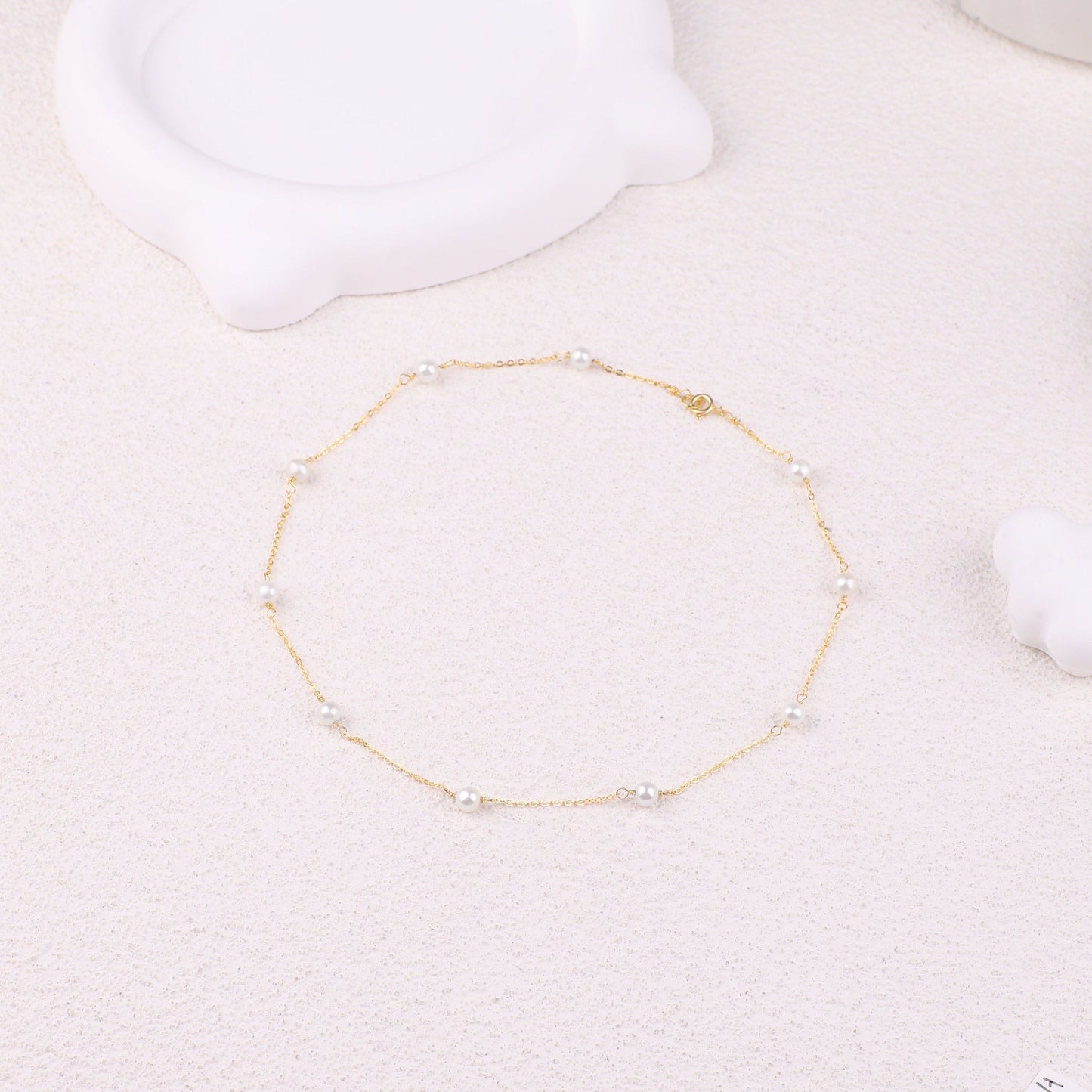 Halsband mit zehn Perlen 